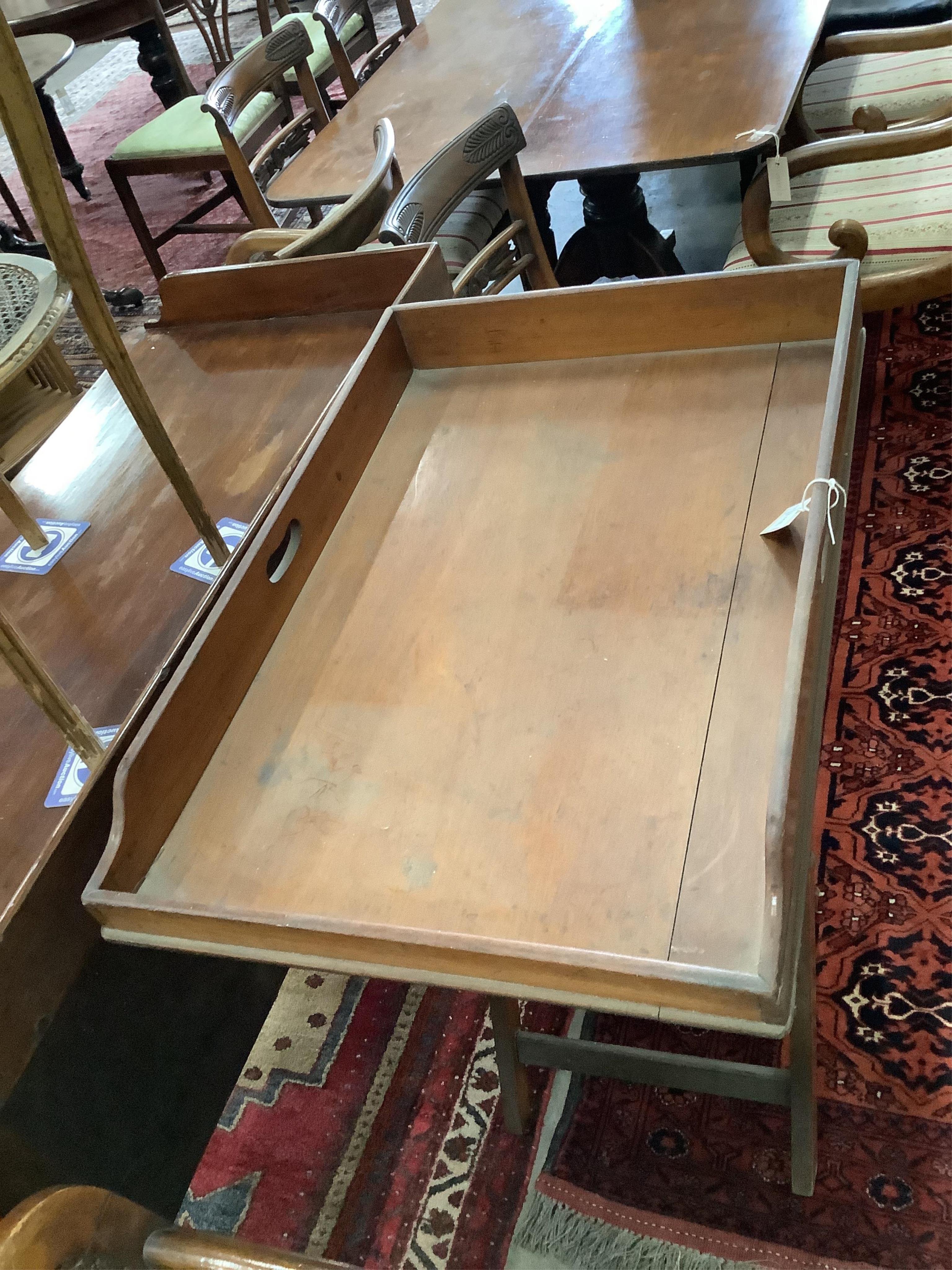 A Victorian rectangular mahogany butler's tray on folding stand, width 78cm, depth 52cm, height 90cm. Condition - fair